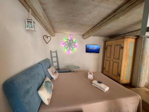 TV a/nebo společenská místnost v ubytování B&B Casa Fiore