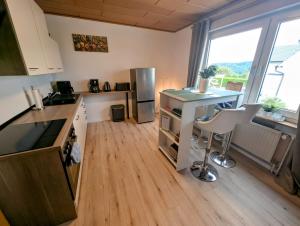 Η κουζίνα ή μικρή κουζίνα στο Ferienhaus Köster +4 φωτογραφίες
