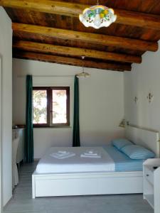 A bed or beds in a room at Il Siriaco