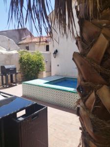 a swimming pool in the backyard of a house at Casa Real in Salar
