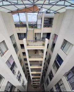 an overhead view of an apartment building with a staircase at Tsavo studio in Nairobi