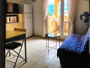 Ένα ή περισσότερα κρεβάτια σε δωμάτιο στο Appart de vacances