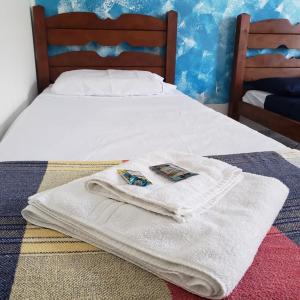 Ένα ή περισσότερα κρεβάτια σε δωμάτιο στο La Linda playa