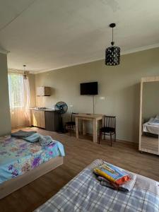 Postel nebo postele na pokoji v ubytování Guest house Gio + 37 fotografií