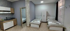 Postel nebo postele na pokoji v ubytování Apartman SPLENDID