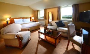 Rúm í herbergi á Brandon Hotel Conference & Leisure Centre
