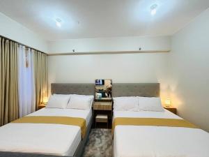 Billede fra billedgalleriet på Jasrich Suite Behind SM trece martires HOPE RESIDENCES SMDC i Cavite