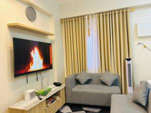 Billede fra billedgalleriet på Jasrich Suite Behind SM trece martires HOPE RESIDENCES SMDC i Cavite