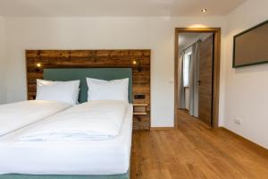 Postel nebo postele na pokoji v ubytování Hotel und Landgasthof Zachschuster + 5 fotografií