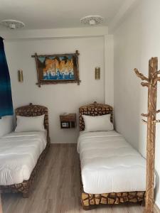 Voodi või voodid majutusasutuse Palacio Del Sol toas
