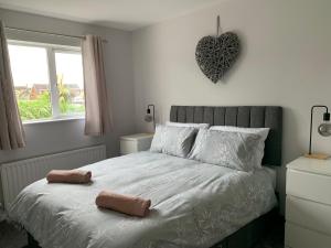 Ένα ή περισσότερα κρεβάτια σε δωμάτιο στο Beautiful apartment in Newtownabbey