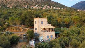 an aerial view of a house with a gazebo at Spitiko Marias in Tséria +11 photos