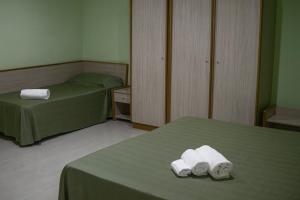 Postel nebo postele na pokoji v ubytování Citta' Dei Papi