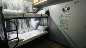 Ліжко або ліжка в номері Da Java 18 hostel and Homestay Chikmagalur