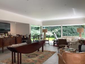 a living room with a pool table in it at Gleann Fia Country House in Killarney