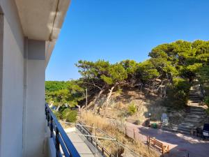a view of a hill from the balcony of a building at Heraklion Centre Experiene in Heraklio