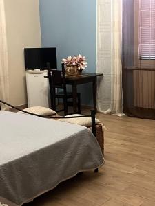 TV a/nebo společenská místnost v ubytování B&B Colle Cucchiara + 37 fotografií