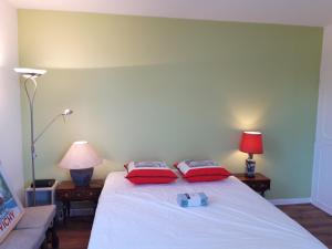 Postel nebo postele na pokoji v ubytování chambre d'hôte