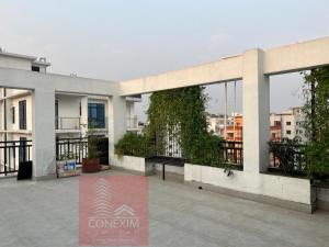 a building with a bench in front of it at Fully Furnished One Bed Room Apartment with Kitchen A007 in Dhaka +13 photos