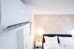 Voodi või voodid majutusasutuse Luxury Rooms Pojta toas