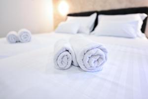 Postel nebo postele na pokoji v ubytování Luxury Rooms Pojta + 35 fotografií