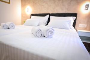 Voodi või voodid majutusasutuse Luxury Rooms Pojta toas