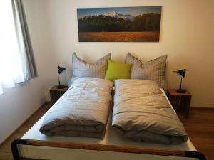Postel nebo postele na pokoji v ubytování Quartier No. 7 - Serviced Living
