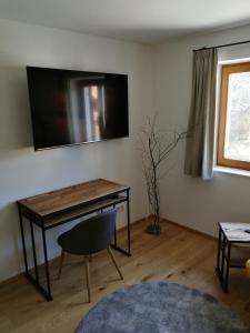 TV a/nebo společenská místnost v ubytování Quartier No. 7 - Serviced Living
