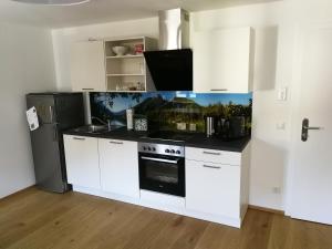 Kuchyň nebo kuchyňský kout v ubytování Quartier No. 7 - Serviced Living