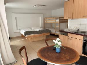 Kuchyň nebo kuchyňský kout v ubytování Hotel Adler I Haus-Innenhof
