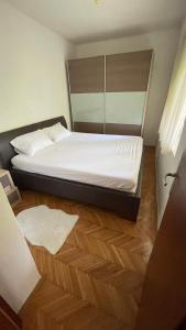 Postel nebo postele na pokoji v ubytování Stan Daleka Obala