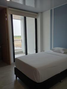 Postel nebo postele na pokoji v ubytování RB Hotel