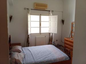 Postel nebo postele na pokoji v ubytování Dar Khalilo + 5 fotografií