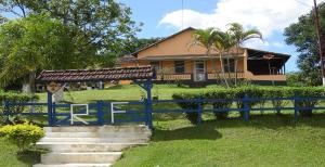 Κήπος έξω από το Pousada Recanto da Fonte