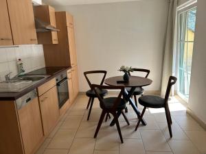 Kuchyň nebo kuchyňský kout v ubytování Hotel Adler I Haus-Innenhof