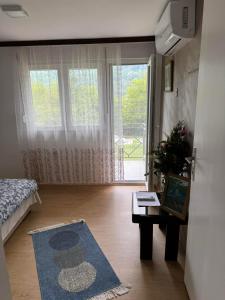 Postel nebo postele na pokoji v ubytování Drinski odmor ,,Mima,, 1