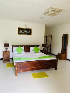 Letto o letti in una camera di Sigiri Prabha Villa