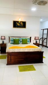 Letto o letti in una camera di Sigiri Prabha Villa