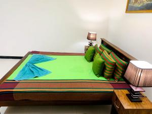 Letto o letti in una camera di Sigiri Prabha Villa