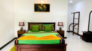 Letto o letti in una camera di Sigiri Prabha Villa