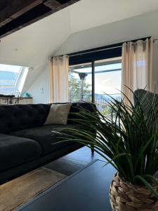 Posezení v ubytování Magnifique Appartement Vue Lac - 5 Personnes
