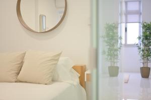 Posteľ alebo postele v izbe v ubytovaní Apartamento Luis Morote Plaza Santa Catalina