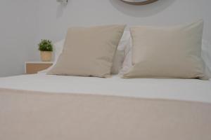Posteľ alebo postele v izbe v ubytovaní Apartamento Luis Morote Plaza Santa Catalina