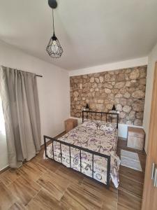 Postel nebo postele na pokoji v ubytování Apartman Krivošije + 7 fotografií