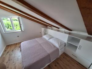 Posteľ alebo postele v izbe v ubytovaní Apartments Šišević - Comfort Apartments with Balconies and Sea View