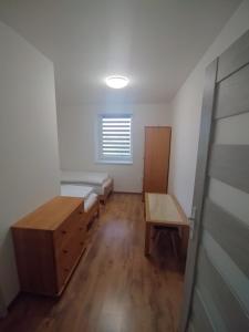 Posteľ alebo postele v izbe v ubytovaní Ubytovanie s kuchynkou