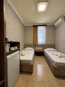 Styopa Hotel客房内的一张或多张床位