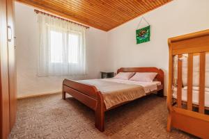Postel nebo postele na pokoji v ubytování Guest House Highland