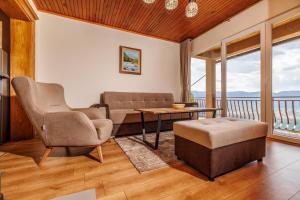 Posezení v ubytování Guest House Highland