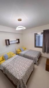 Postel nebo postele na pokoji v ubytování Cozy 4-Bedroom In Marina Marassi